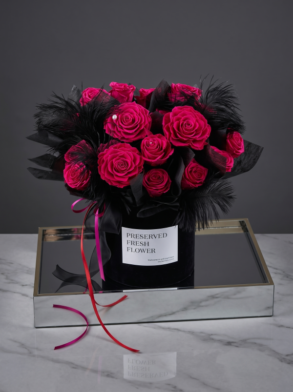 Bucket arrangement with 19 roses